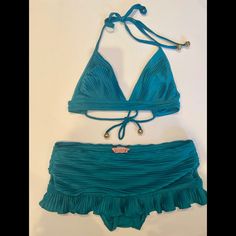 Nwot Vintage Bikini! Tried On But Never Worn, I Really Wanted This To Work For Me... But It Didn’t And I Found It In My Closet! Super Soft With Pleating Detail. The Bottoms Have A Skirt With A Ruffle Hem. Top Has Ties With Gold Metal Ball Detail On Ties. 92% Polyester 8% Spandex Siren Bathing Suit, 2000s Swimsuit Aesthetic, 2000s Bikinis Vintage, 70s Bikinis Vintage, Elegant Blue Triangle Top Swimwear, Turquoise Fitted Tie-side Swimwear, Fitted Triangle Top Tankini For Pool, Turquoise Fitted Tankini For Poolside, Fitted Turquoise Tankini For Poolside