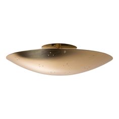 a brass plated ceiling light on an isolated white background