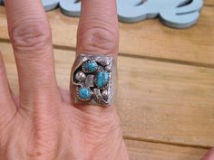 Sterling Silver Turquoise Rectangle Ring Size 9.5. We can resize for an additional fee, please email me with the size you need and I'll get back to you with a price. The face of the ring measures 20 millimeters in length and 14 millimeters across. An Awesome statement ring! Thank you for stopping by my shop, please come back soon Rectangular Turquoise Ring For Anniversary, Rectangular Turquoise Rings For Anniversary, Anniversary Turquoise Rectangular Ring, Anniversary Rectangular Turquoise Ring, Unique Rectangular Turquoise Ring, Handmade Turquoise Rectangular Rings, Rectangular Blue Turquoise Sterling Silver Ring, Handmade Silver Turquoise Ring With Rectangular Shape, Handmade Rectangular Silver Turquoise Ring