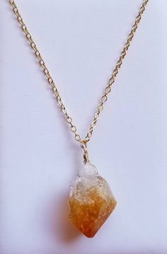 Raw Citrine Crystal Cluster Necklace, Orange Citrine Pendant Necklace, Gold Boho Bohemian Jewelry, Birthday Gift, Raw Stone Pendant Necklace This natural raw citrine cluster pendant necklace is suspended on a 14kt gold filled chain. Dress your jeans up with this stylish piece or wear long with your favorite sweater. This chic necklace goes great with just about anything. Whether a gift for yourself or your loved one, this necklace is sure to impress. This necklace also comes gift wrapped. Pendan Citrine Cluster, Orange Citrine, Raw Citrine, Necklace Orange, Chain Dress, Citrine Pendant, Pendant Necklace Gold, Chic Necklace, Citrine Necklace