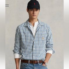 New With Tag Polo Ralph Lauren Classic Fit Gingham Workshirt Color: Blue/White Classic Fit: Our Roomiest Silhouette. Cut For A Lower Armhole And A Fuller Sleeve. Size Medium Has A 30.5" Back Body Length, An 18.25" Shoulder, A 46" Chest, And A 34.5" Sleeve Length. Sleeve Length Is Taken From The Center Back Of The Neck And Changes 1" Between Sizes. Spread Collar. Buttoned Placket. Long Sleeves With Buttoned Barrel Cuffs. Two Chest Buttoned Pockets. Pleated Back Yoke Ensures Smooth, Contoured Shou Casual Collared Gingham Shirt, Casual Gingham Collared Shirt, Casual Gingham Cotton Flannel Shirt, Preppy Cotton Shirt, Gingham Cotton Shirt For Work, Plaid Cotton Work Tops, Preppy Gingham Collared Tops, Preppy Plaid Cotton Top, Relaxed Fit Gingham Collared Shirt