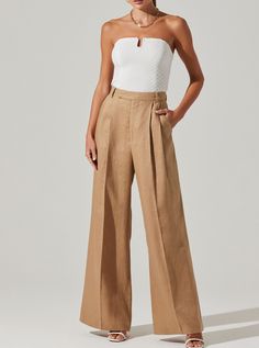 Experience ultimate comfort and style in our Khaki Milani Pants. With a wide leg and pleat front design, these trousers are both effortlessly chic and fit several body types. Perfect for any occasion, you can dress them up or wear them with a fitted tee and sandals. Wide leg pleat front trousers Belt loops Functional s True Winter, Fitted Tee, Vest White, Mini Dress Shop, Trouser Pants, Front Design, Wide Leg Trousers, S Models