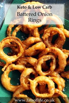 keto and low carb battered onion rings on a green plate with text overlay