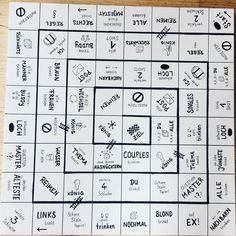 a black and white game board with words on it