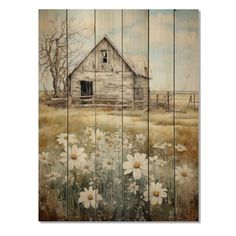 an old barn with daisies painted on it