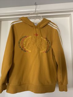 Adidas Yara Shahidi Women’s Rare Pullover Hoodie Sweatshirt Gold Authentic-L. Description YARA SHAHIDI ADIDAS ~ WHO ARE WE IF NOT EACH OTHER ~ 100% Cotton Hoodie Sweatshirt Size Large, 21” across the bust and 24” from shoulder to hem. Gently worn, no holes or excessive wear. Yara Shahidi, Cotton Hoodie, Hoodie Sweatshirt, Pullover Hoodie, Adidas, Sweatshirts Hoodie, Sweatshirts, Gold, How To Wear