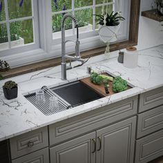 a kitchen sink sitting under a window next to a cutting board with broccoli on it