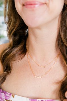 This name plate necklace is the perfect gift for any mama. Crafted from gold filled metal, and featuring a stunning script font, this necklace is sure to become an everyday favorite. Details:Gold FilledChoose from 16" or 18" chain Your jewels will arrive in one of our velvet gift pouches. Perfect for gifting, storing your delicate jewels at home or traveling on your next getaway! Dainty Everyday Name Necklaces, Dainty Everyday Necklaces With Names, Everyday Name Necklaces For Mother's Day, Mother's Day Necklaces With Names, Custom Name Necklaces For Mother's Day, Custom Name Necklaces For Everyday & Mother's Day, Custom Name Necklace For Everyday Use, Dainty Name Necklace For Everyday, Meaningful Custom Name Necklaces For Everyday