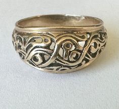 "a very unusual gold ring made by Orange Blossom, a division of Traub jewelers.  as their name implies, the company started out in 1910 making orange blossom style rings, all the rage largely due to Queen Victoria's influence.  the company did beautiful work and continued to until 1990 when it was sold.  they made many wedding sets and rings much more traditional than this, so i was surprised to find that this was also made by them.   the quality is there with a very interesting and lovely desig Domed Ring, Orange Blossom, Rings Statement, Division, Gold Ring, Statement Rings, Gold Rings, Jewelry Rings, Blossom