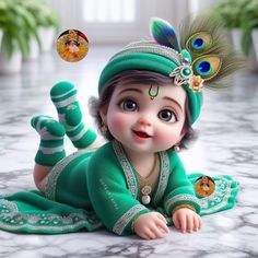 a baby doll is laying on the floor wearing a green outfit and headdress