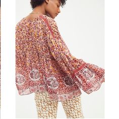 A Mix Of Boho Prints Combine For An Eclectic Look With This Breezy Free People Top, A Layer-Ready Style That Can Be Worn Closed Via Ties At The Front. V-Neck; Ties At Front Chest Trim At Back And Sleeves Polyester Machine Washable Flowy Long Sleeve Tops With A Free-spirited Style, Spring Long Sleeve Blouse With A Free-spirited Style, Hippie Patterned Tops For Fall, Spring Free-spirited Long Sleeve Blouse, Free-spirited Long Sleeve Blouse For Spring, Flowy Patterned Boho Print Tops, Bohemian Patterned Tops For Fall, Flowy Boho Print Patterned Tops, Bohemian Red Blouse Relaxed Fit