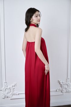 This ethereal silk dress features a halter tie-neck and elongated floor length for a graceful, luxurious silhouette. Crafted from premium mulberry silk, this dress exudes elegance and opulence. Perfect for special occasions or a night out, it will make you feel like a true high-end fashionista. *The length is measured from the chest to the hem. Silk Floor Length Dress, Red Meaning, Mean Blvd, Floor Length Dress, Floor Length Dresses, Tie Neck, Mulberry Silk, Designer Collection, Silk Dress