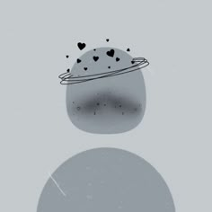 an image of a black and white object with hearts on it's back ground