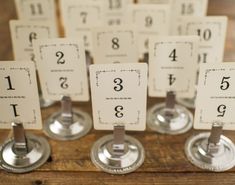 there are many place cards on the table for each person to put in their place