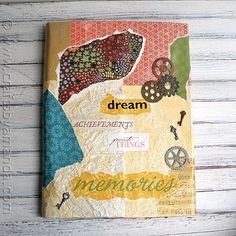 a book with the words dream written on it, and an image of a map