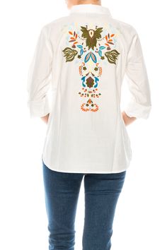 This button-down shirt is made from 100% natural cotton, and features an exquisite floral embroidery on the back. Model is 5’8” - wearing size small. Model Bust: 34” Hand-wash cold, lay flat to dry.Made in India. Bohemian Cotton Button-up Shirt, Multicolor Embroidered Cotton Shirt For Spring, Multicolor Embroidered Cotton Button-up Top, Embroidered Cotton Button-up Shirt, Embroidered Cotton Button-up Top, Cotton Shirt With Floral Embroidery And Relaxed Fit, Cotton Button-up Shirt With Floral Embroidery, Bohemian Style Button-up Shirt With Floral Embroidery, Long Sleeve Cotton Top With Tonal Embroidery