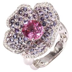 Anémone ring by Mathon Paris at Second Petale Gallery Explore an enchanted universe and witness the vivid colors gemstones with the Anémone ring in purple and pink sapphires, diamonds and white gold. About the Gemstones : Diamonds (0,25 ct) Purple Sapphires (2,69 ct) Pink Sapphires (2,68 ct) ABOUT the CREATOR MATHON PARIS : FRENCH STYLE SINCE 1931 "JOAILLERIE DE FRANCE" label "Living Heritage Company" French State excellence "RESPONSIBLE JEWELLERY COUNCIL" certificate Maison Mathon Paris is the story of a 4-generation family that makes jewelry for the great houses of Place Vendôme, as well as own label creations. Mathon's identity is based on colors and an exceptional savoir-faire in which they have become specialists: lacquering, sculpting, hand engraving, gold texturing, chasing. All sta Style Français, International Jewelry, Purple Sapphire, White Gold Ring, Sapphire Diamond, Hand Engraving, Anemone, French Style, Pink Sapphire