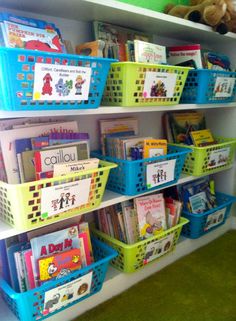 the bookshelf is filled with children's books and other items for display