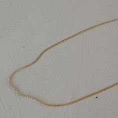 Description Dainty and elegant chain that makes the perfect addition to your layered necklaces. It has a wavy design to it. Material Stainless Steel base 18k PVD gold plating 16 in + 2 in extender How to care for your jewelry: Water resistant but always strongly recommend removing your jewelry before participating in any activities that can lead to contact with moisture or chemicals, such as washing your hands, sleeping in your jewelry, or showering, to maintain shine and ensure a long lifetime. Dainty Curb Chain Jewelry For Layering, 14k Gold Filled Chain Link Necklace With Adjustable Chain, 14k Gold-filled Oval Link Necklaces, Delicate 14k Gold Curb Chain Jewelry, Yellow Gold Delicate Chain Long Necklace, Yellow Gold Delicate Long Chain Necklace, Minimalist Curb Chain Necklace For Layering, Delicate Gold Jewelry With Curb Chain, Delicate Gold-plated Chain Necklace