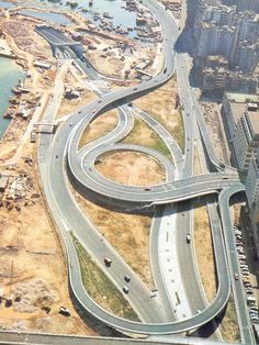 an aerial view of multiple roads in the city