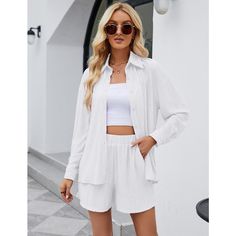 Elevate your casual wardrobe with the KOJOOIN Women's 2 Piece Plisse Set, a chic ensemble perfect for summer days. This set pairs a button-down shirt with coordinating shorts, crafted from 100% polyester for a lightweight and breathable feel. Ideal for lounging at home, running errands, or casual outings with friends.

- Material: 100% Polyester
- Color: Available in Black, White, Blue, and more
- Size: S (4-6), M (8-10), L (12-14), XL (16), 2XL (18-20)
- Gender: Female

The textured top and sho White Solid Color Shirt For Summer, White Shirt For Summer, Summer Collared Shirt For Day Out, Summer Shirt With Pockets For Day Out, Casual Summer Blouse For Daywear, Summer Day Out Collared Shirt, Casual Solid Color Summer Blouse, Casual Summer Blouse Solid Color, Casual Summer Blouse In Solid Color