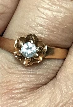 Vintage 14K Yellow Gold 1/4 CT ROUND DIAMOND Flower Engagement Ring Beautiful! Gorgeous ring! * Crafted in solid 14K yellow gold, the ROUND cut center diamond is approximately .25ct. G/H color. * Very pretty ring! * 2.3 grams * Size 6.75 with sizer (there is a sizer in ring band)  * Will ship Insured 14k Gold Flower-shaped Diamond Ring For Anniversary, Gold Diamond Flower Ring For Anniversary, Formal 14k Gold Flower Diamond Ring, Classic 14k Stamped Flower Ring For Anniversary, 14k Rose Gold Flower Ring For Anniversary, Rose Gold Flower Ring Stamped 14k For Anniversary, Black Opal Pendant, Flower Engagement, Locket Ring