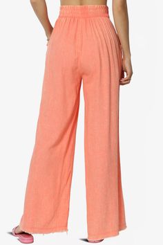 Discover the perfect blend of boho-chic and comfort with these Washed Linen Wide Leg Pants.Their elastic waistband and frayed hem offer a relaxed, yet stylish fit that moves with you.Crafted from a breathable linen blend, these versatile slacks are a must-have for effortless summer style.Dress them up for work or keep it casual for a weekend getaway. With slant pockets for convenience and a timeless wide-leg design, these full-length pants are ideal for every occasion.Trendy Wide Leg Pants: Capt Relaxed Spring Harem Pants With Elastic Waistband, Casual Ankle-length Beach Bottoms, Relaxed Harem Pants With Elastic Waistband For Spring, Spring Vacation Wide Leg Pants With Pull-on Style, Bohemian Straight Leg Pants For Vacation, Chic Wide-leg Pants With Frayed Hem, Wide Leg Pull-on Pants For Spring Vacation, Relaxed Fit Ankle-length Bottoms For Vacation, Trendy Rayon Bottoms With Elastic Waistband