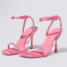 The Luxon Crystal Heeled Sandal In Taffy. The Sensual Drape Of A Crystal Harness Elevates This Barely There Satin Sandal. Slim Straps Wrap Elegantly Around The Ankle; Buckle Closure. Glamorous Pink Sandals With Branded Heel Counter, Pink Evening Heels With Single Toe Strap, Pink Single Toe Strap Heels For Evening, Pink Sandals With Single Toe Strap And Branded Heel, Pink Sandals With Single Toe Strap For Party, Pink Sandals With Heel Loop And Single Toe Strap, Pink Sandals With Heel And Single Toe Strap, Crystal Harness, Crystal Heels