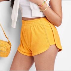 New With Tags Yellow Leisure Bottoms For Summer, Trendy Beach Season Bottoms For Leisure, Trendy Leisure Bottoms For Beach Season, Trendy Beach Season Leisure Bottoms, Sporty Loungewear Bottoms For Beach Season, Women Towel, Rolled Cuff Jeans, Terry Romper, Dolphin Shorts