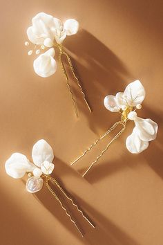 Hand-sculpted sweet peas shimmer lightly among glass beads and freshwater pearls on these stunning pins. Floral Hair Pins, Anthropologie Wedding, Pearl Hair Pins, Flower Headpiece, Sweet Peas, Crystal Headband, Wedding Hair Pins, Flower Hair Pin, Pearl Headband