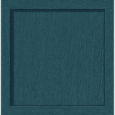 an image of a wooden frame in teal green wood grained with dark blue paint