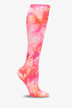 Treat your feet and legs to a little support. The light, gradient compression of Nurse Mates NA0033599-Tie Dye-Fuchsia Flame Women s Compression Socks is designed to help energize and soothe. Compression is greatest at the ankle, lessens gradually to the non-binding top band. Colorful, long-lasting print. One size fits most. • Nylon-stretch blend • Light compression: 12-14 mmHg • Gradient compression • Controlled pressure from the ankle up • Promotes better blood circulation • Reduces leg fatigu Pink Stretch Knee-high Socks, Comfortable Stretch Pink Knee-high Socks, Pink Sports Socks, Breathable Sports Socks For Spring, Comfortable Pink Knee-high Socks, Comfortable Knee-high Pink Socks, Pink Comfortable Stretch Socks, Breathable Fitted Socks For Spring, Spring Fitted Breathable Socks