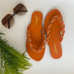 Orange Braid Sandals Orange And Chain Braid Detail Brand New In Box Various Sizes Trendy Beach Sandals With Chain Strap, Summer Vacation Sandals With Chain Strap, Vacation Sandals With Chain Strap And Synthetic Material, Beach Sandals With Chain Strap For Summer, Synthetic Sandals With Chain Strap For Vacation, Flat Sandals With Chain Strap For Beach, Casual Sandals With Chain Strap For Vacation, Chain Strap Sandals For Vacation, Elegant Orange Beach Sandals