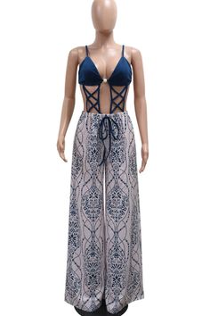 Details: Material: Polyester Style: Sexy Pattern Type: Print Element: Hollow Out, Patchwork, Backless Neckline: Spaghetti Strap Elastic: Yes(Elastic) Sleeve Length: Sleeveless Fit Type: Loose Profile: Wide Leg Type: Full Print Size(in) Bust Waist Length Hips S 29.9 25.2 57.9 43.3 M 31.5 26.8 58.5 44.9 L 33.9 29.1 59.1 47.2 XL 36.2 31.5 59.6 49.6 2XL 38.6 31.5 60.2 52 Tips:Due to the many variations in monitors, the color in the image could look slightly different, please take physical design and color shall prevail.Please allow 0.4"-1" differs due to manual measurement. Stretch Jumpsuit With Spaghetti Straps For Vacation, Stretch Jumpsuits And Rompers With Spaghetti Straps For Vacation, Summer Party Jumpsuits And Rompers With Built-in Bra, Backless Jumpsuits And Rompers For Beach Party, Stretch Hollow Out Bodysuit For Summer, Stretch Bottoms With Straps For Summer, High Waist Stretch Jumpsuits And Rompers For Beach, Summer Hollow Out Bodysuit For Night Out, Summer Party Bottoms With Lined Body