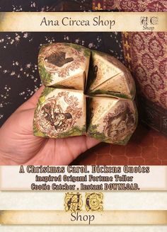 an origami christmas carol dice is shown in this advertisement