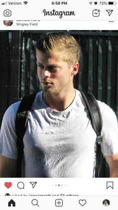 an instagram photo of a man with blonde hair wearing a white t - shirt