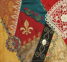 an assortment of different colored laces and fabric on a piece of cloth with fleur - de - l'oeuvres