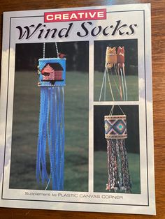 an advertisement for creative wind socks on a wooden table with pictures of different items hanging from it