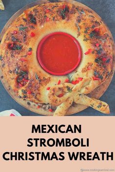 mexican stromboli christmas wreath with sauce in the middle and other ingredients around it