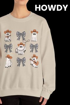 Looking for a fun way to mix up your Western style? This cozy sweatshirt, with its cute cowboy ghosts and cow print coquette bows, brings a little spooky charm to your wardrobe. It’s perfect for anyone who loves a mix of fun, fashion, and a dash of Halloween spirit. Want to stay warm and stylish? Check it out! Reunion Gift, Western Sweatshirts, Western Halloween, Coquette Bows, Latina Fashion, Women's Sweatshirts, Latest T Shirt, Fall Sweater, T Shirts Men