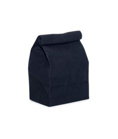 a black bag sitting on top of a white surface