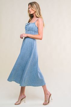 A washed denim midi dress featuring straight neckline with front tie, straps, waist yoke, full skirt and back zipper closure Details: Self : 83% Cotton 17% Viscose Size & Fit - Model is 5`8" And Wearing Size Small- Measurements Taken From Size Small- Approx. Length: 49" Denim Midi Dress, Flying Tomato, Straight Neckline, Denim Mini Dress, Washed Denim, Denim Mini, Full Skirt, Denim Wash, Fitness Models