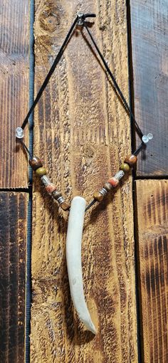 Our necklaces are a mix between Nordic and Native cultures with a heavy emphasis on self-defense. Widely regarded as spiritual totems they are known to dissuade and repel evil spirits while attracting praise and attention from all who see it. Horns are ethically sourced from Texas farms and ranches. White Adjustable Necklaces For Rituals, Adjustable White Necklaces For Rituals, Spiritual White Necklaces For Rituals, Spiritual White Necklace For Rituals, Unique Hand-strung Necklaces For Rituals, Ranches In Texas, Spiritual One-of-a-kind Metal Necklace, Totem Necklace, Wolf Totem Necklace