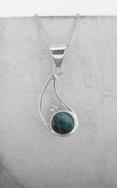 Turquoise Necklace : A simple and elegant turquoise pendant set in sterling silver and finished with your choice of 16, 18, 20, 22, 24 inch trace chain.  If you would prefer a different style chain see my chains selection https://www.etsy.com/uk/shop/EvieWallaceDesigns?section_id=21644437 💖 SIZE The pendant measures 12mm x 30mm including bale approx and has been hand set into a sterling silver setting. 💖 PRODUCT INFORMATION Turquoise has been valued for its gorgeous colours for thousands of ye Elegant Green Turquoise Necklace In Chrysocolla, Elegant Green Chrysocolla Turquoise Necklace, Elegant Green Turquoise Chrysocolla Necklace, Elegant Turquoise Chrysocolla Necklace, Elegant Teardrop Turquoise Necklace Nickel Free, Elegant Nickel-free Teardrop Turquoise Necklace, Elegant Teardrop Turquoise Nickel-free Necklace, Elegant Turquoise Teardrop Pendant Drop Necklace, Elegant Green Teardrop Turquoise Necklace