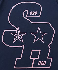 the back of a black shirt with pink lettering and stars on it that says,'99