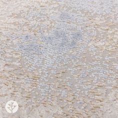 an area rug is shown with blue and beige colors