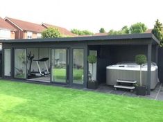 a house with a hot tub and exercise equipment