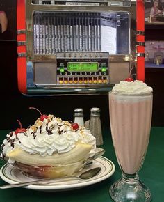 there is a cake and a drink on the table