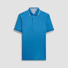 Experience the ultimate in comfort and style with this solid-colored polo, crafted from 100% Pima cotton featuring a striking printed contrast fabric, a classic three-button placket, and ribbed collar and sleeve cuffs accented with chevron knit detail and contrast tipping. For a casual occasion or on the golf course, this polo effortlessly combines comfort and style. Blue Collared Polo Shirt With Placket, Blue Cotton Polo Shirt With Placket, Spring Cotton Polo Shirt With Contrast Collar, Blue Polo Shirt With Collar And Placket, Blue Polo Shirt With Collar, Blue Polo Shirt With Collar Placket, Work Polo Shirt With Button Cuffs, Workwear Polo Shirt With Button Cuffs, Blue Polo Shirt With Button Closure And Spread Collar