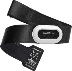 the garmin belt has an electronic tag attached to it's back end and is next to a card